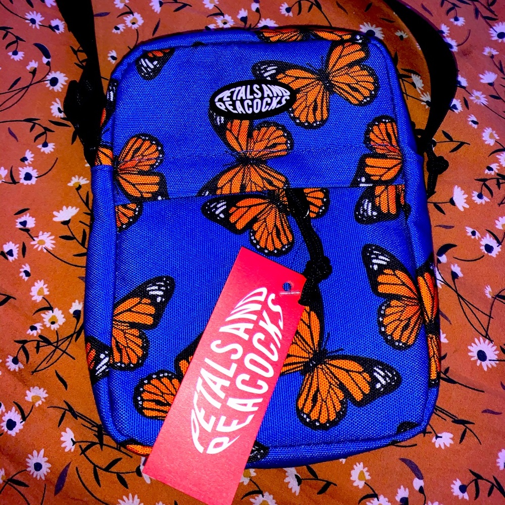 Brand new with tags petals and peacocks bag